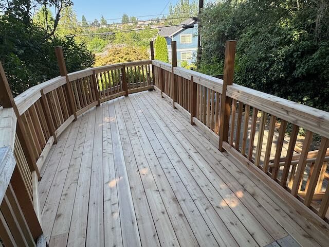 Custom cedar deck with curved railing